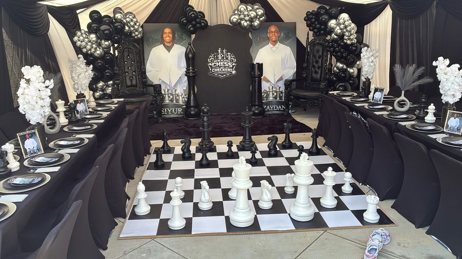 Black and white chess-themed party tablescape